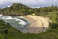 Green Hill on the coast named Pantai Srau Royalty Free Stock Photo