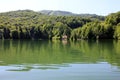 Green hill and lake panorama view Royalty Free Stock Photo