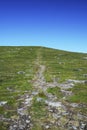 Green hill with path in the sky.