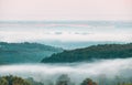 Green hills in the morning mist. Royalty Free Stock Photo