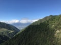 Green hills under the blue sky