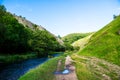 Green Hills, River Dove in Peak District National Park Royalty Free Stock Photo