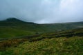 Green hills and a road near Pen y Fan peak, Brecon Beacons National Park, Wales, UK Royalty Free Stock Photo