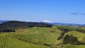 Green hills and volcanoes landscape panorama Royalty Free Stock Photo