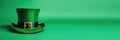 green holiday hat, leprechaun hat, clover leaves, Irish shamrock, magic and luck, horizontal web banner, green