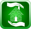 Green home in open hands Royalty Free Stock Photo