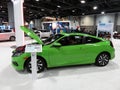 Green Honda Civic Couple at the Auto Show