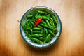 Green hot cayenne pepper on wood table Royalty Free Stock Photo