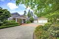 Green house with beautiful curb appeal.