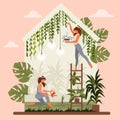 Green house, concept of ecology and plant care. Lovely girls take care of the flowers.