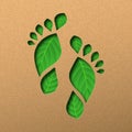 Green human foot print paper cut leaf concept Royalty Free Stock Photo