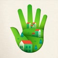 Eco friendly city in green paper cut hand