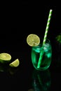 GREEN ICED DRINK DECORATED WITH LEMON Royalty Free Stock Photo