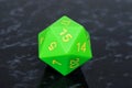 Green icosahedron 20 sided dice.