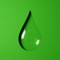 A green image featuring a clear, three-dimensional water droplet shape cut into the Royalty Free Stock Photo