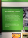 Green indoor exhibit signage at Detroit Historical Museum