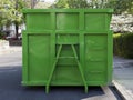 Green industrial dumpster