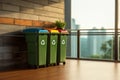 Green initiative recycling bin placed conveniently close to the wall Royalty Free Stock Photo