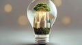 Green Innovation: Buildings and Tree in a Light Bulb for Sustainable Environmental Harmony and Climate Change Royalty Free Stock Photo