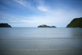 Green island and sea with a wave and clear blue sky, prachuapkhirikhan Thailand