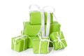 Green isolated gift boxes tied with white ribbon for christmas Royalty Free Stock Photo