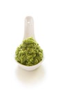 Green italian homemade sauce pesto in stone pounder