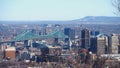 A green Jacques Cartier Bridge contrasted against the Montreal skyline. Royalty Free Stock Photo