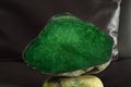 Green jade Large, beautiful, rare and expensive cubes Laying on top of the sofa