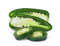 Green jalapeno peppers with half slice isolated on a white Royalty Free Stock Photo