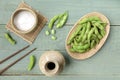 Green Japanese Soybean in wooden bowl on table wood