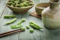 Green Japanese Soybean in wooden bowl on table wood