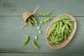 Green Japanese Soybean in wooden bowl on table wood