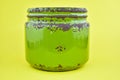 Green jar. Rusty tin view, ceramic jar.