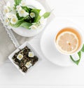 Green jasmine tea, jasmine petals, topview Royalty Free Stock Photo