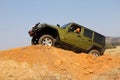 Green Jeep Wrangler Unlimited on 4x4 Course Royalty Free Stock Photo