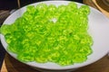 Green Jello isolated on a white plate. Green Jelly, green gelatine