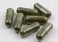 Green jiaogulan extract supplement capsules Royalty Free Stock Photo