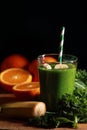 Fresh kale smoothie with granges and bananas Royalty Free Stock Photo