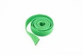 green karate belt on white background