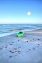 Green kayak on the white sand of Tigertail Beach in Marco Island Royalty Free Stock Photo