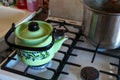 Green kettle boil on a gas stove Royalty Free Stock Photo