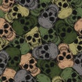 Green khaki camouflage pattern with human skulls Royalty Free Stock Photo