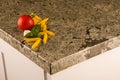 Green kitchen countertop with food on it. Granite counter concept. Royalty Free Stock Photo