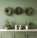 Green Kitchen With Wreaths on Wall