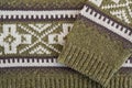 Green knitted sweater with geometric ornament detail