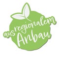 green label with text AUS REGIONALEM ANBAU, German for locally grown Royalty Free Stock Photo