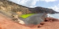 Green lake Charco de Los Clicos Verde near El Golfo panorama on Lanzarote island on Canary Islands in Spain