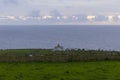 The green landscape and the Atlantic Ocean around Lighthouse of Ponta da Ferraria. Sao Miguel, Azores