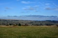 Green landscape  with a meadow, trees and blue sky in the RhÃÂ¶n, Germany Royalty Free Stock Photo