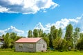 Green landscape and new house, blue sky. Sample image for village tourism Royalty Free Stock Photo